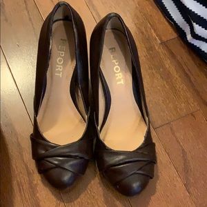 Report brown heels. Well loved.